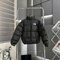 The North Face Men's Matte Black 700-Fill Down Jacket – All-Over Solid Color Stand Collar Wide-Baffle Puffer