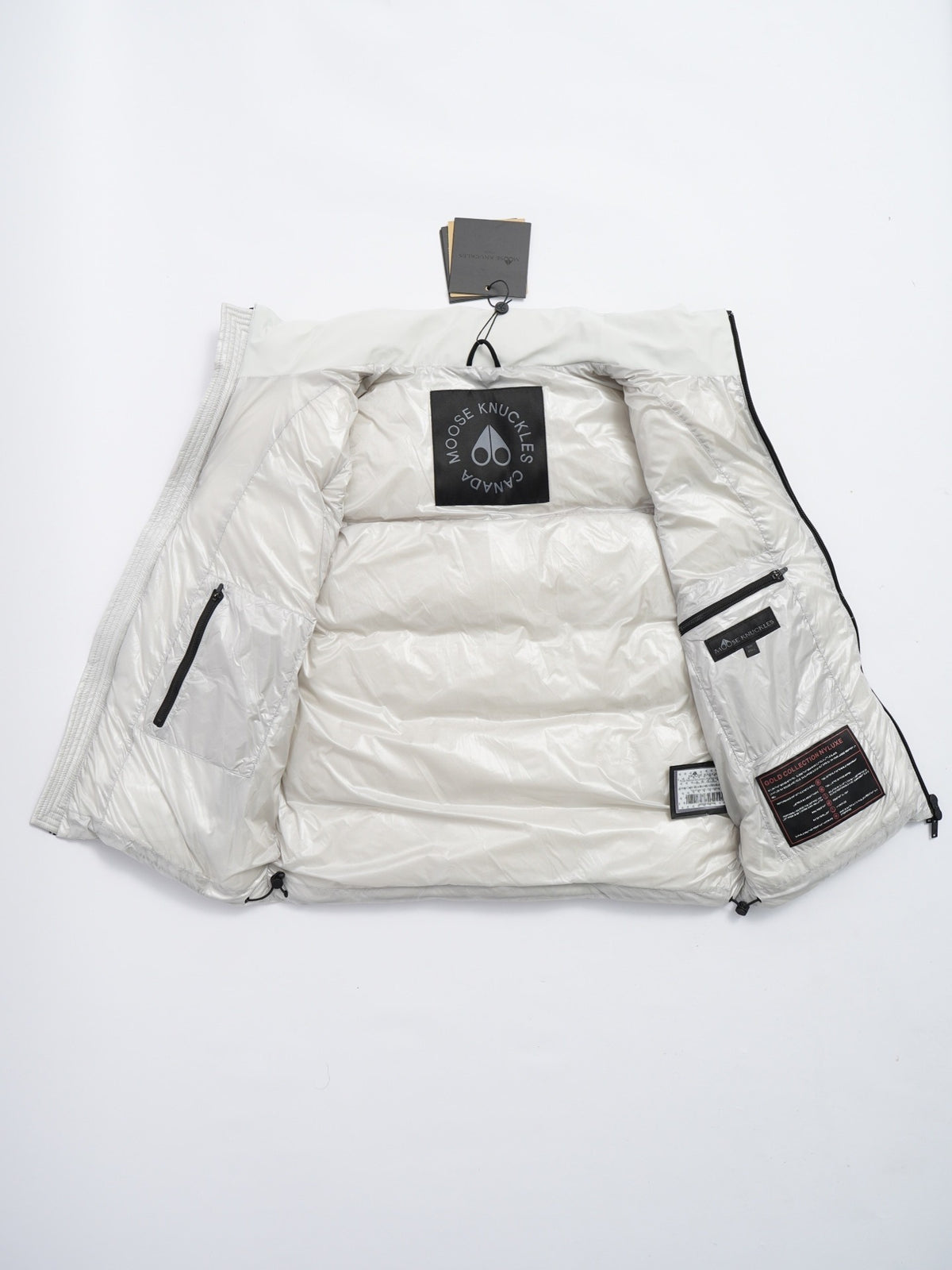 Moose Knuckles Women's White Down Vest – Sleeveless Puffer Jacket