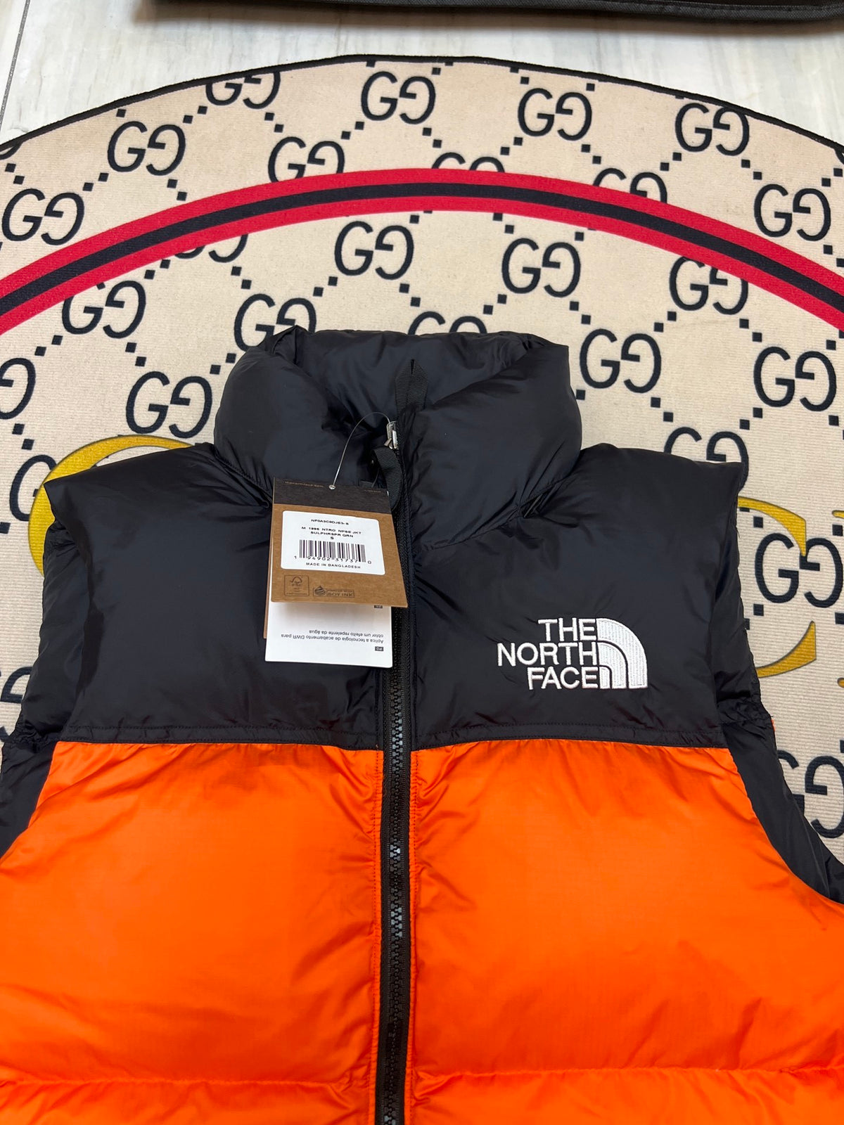 The North Face Men's Orange Down Vest – 1996 Retro Nuptse Sleeveless Puffer Jacket