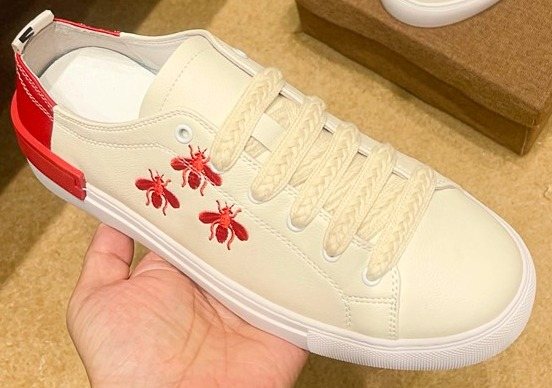 White Low-Top Sneakers with Red Floral Accents